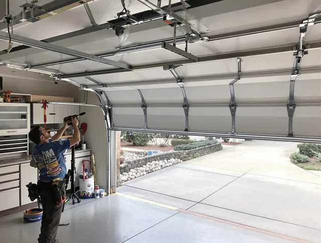 Garage door track repair service by Tiverton Garage Door Repair in Tiverton